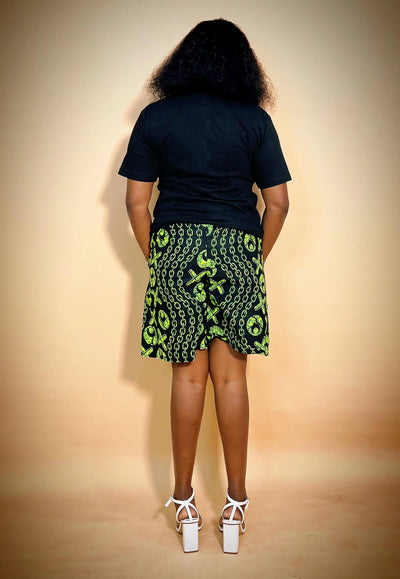 Back view of woman wearing an Ankara Print Two Piece Set on a beige background