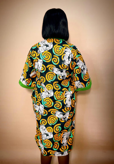 Person wearing an African Multicolored Bubu Gown on a blurred background 