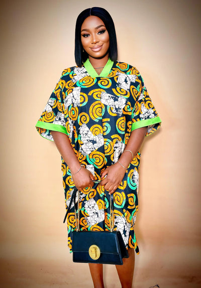 Woman wearing an African Multicolored Bubu Gown on a blurred background