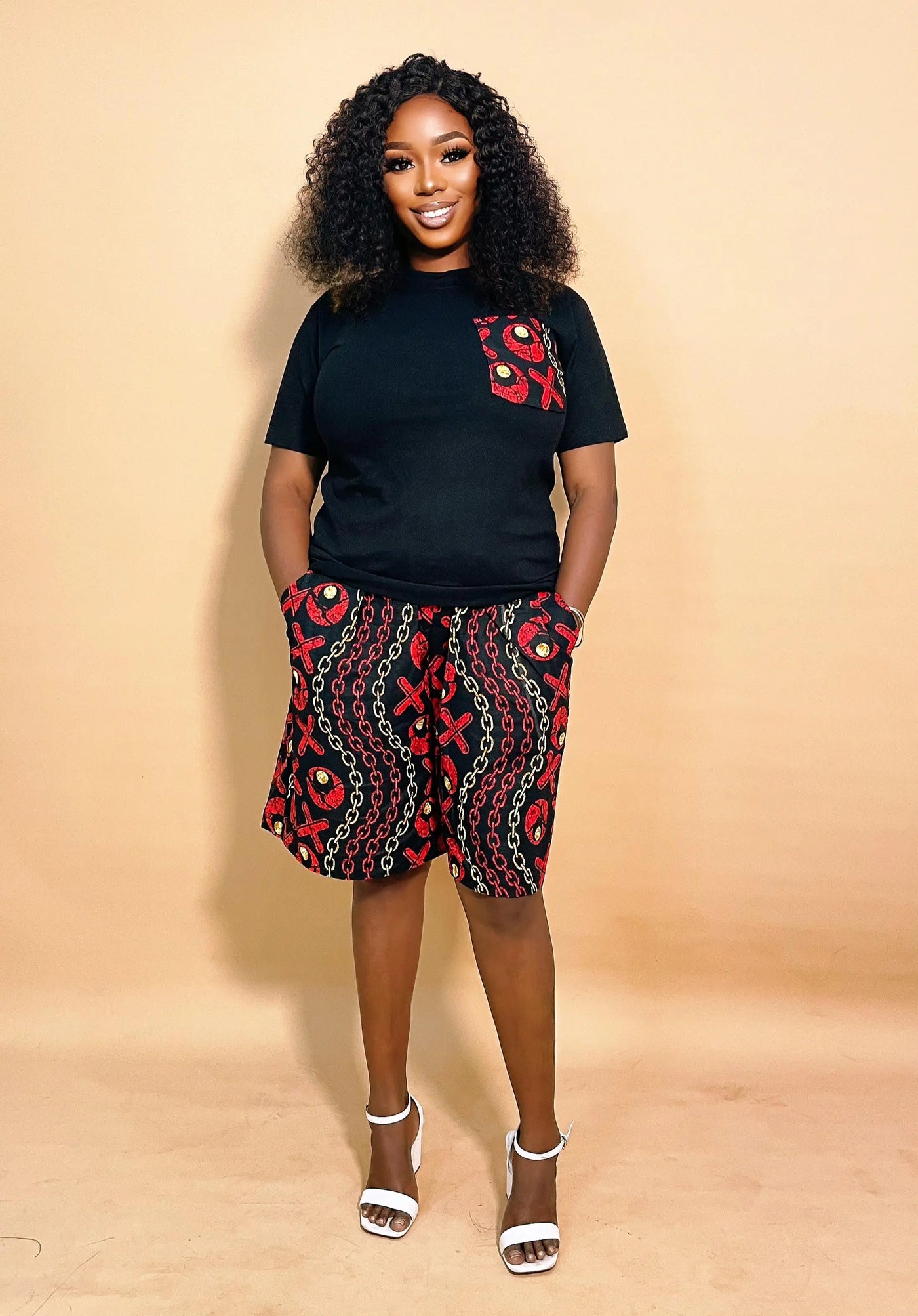 Woman wearing an Ankara Print Two Piece Set on a beige background