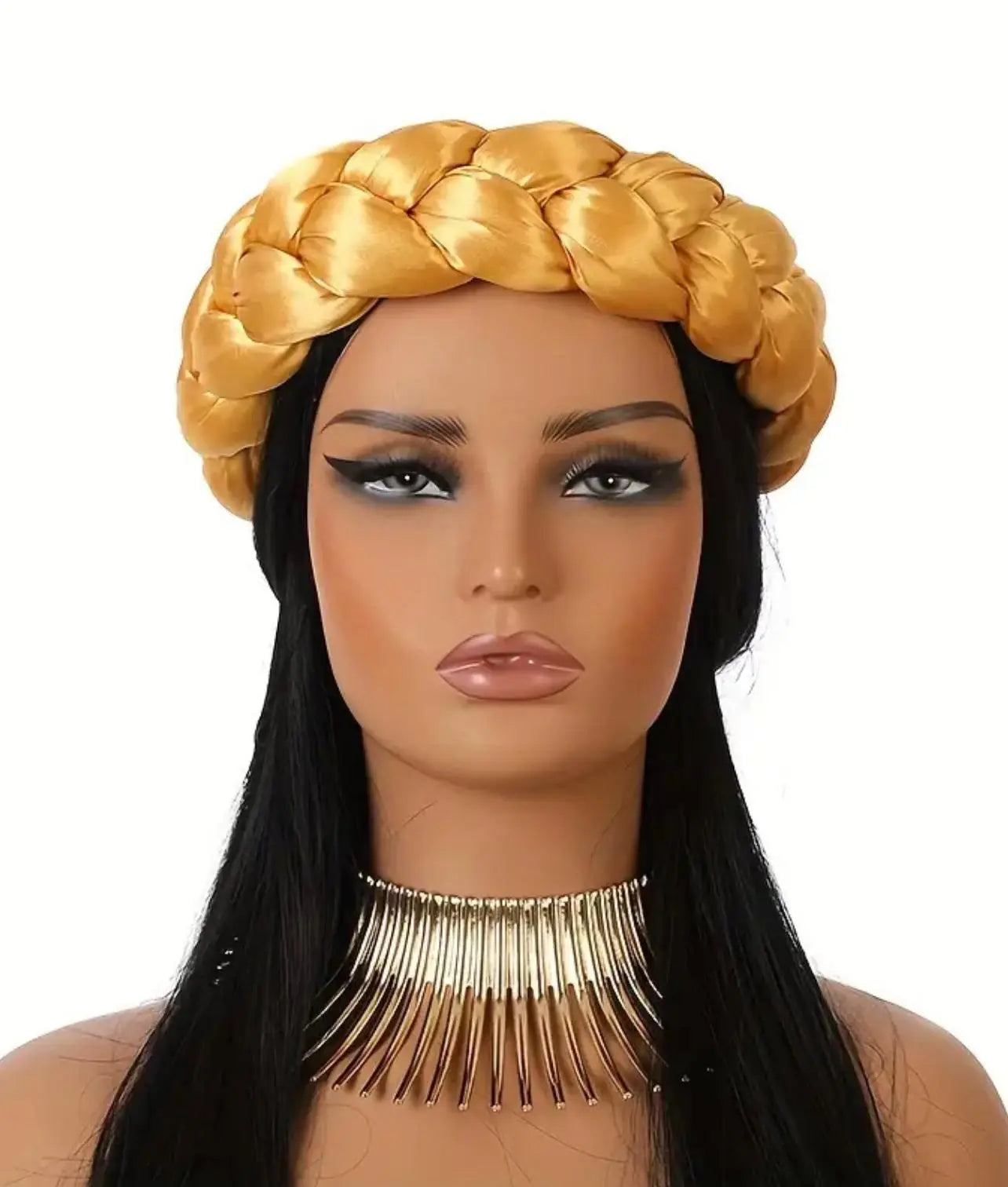 Mannequin head with yellow braided satin headband scarf and long black hair on a white background