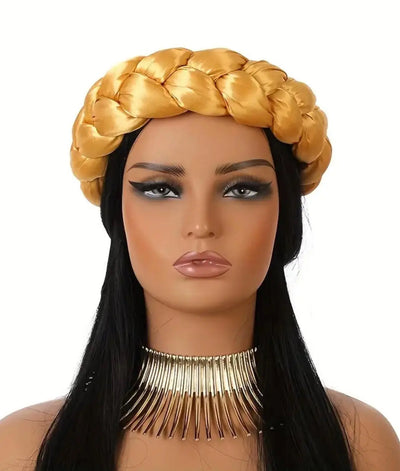 Mannequin head with yellow braided satin headband scarf and long black hair on a white background